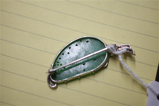 A white gold mounted carved jadeite and diamond gourd brooch, 48mm.